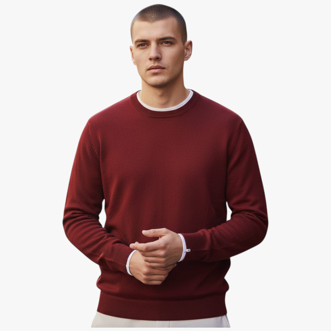 Man wearing a maroon sweater on a white background