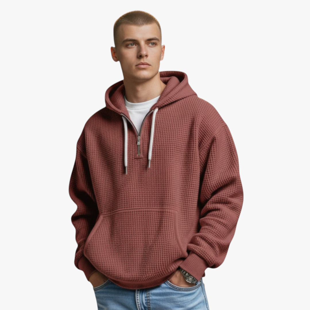 Man wearing a red hoodie on a white background